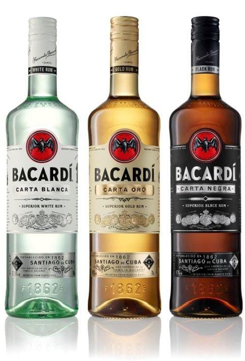 Bacardí Carta Blanca, Carta Oro, and Carta Negra rum bottles